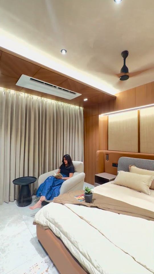 A bedroom designed for the heart of the home. Warm wooden textures,…