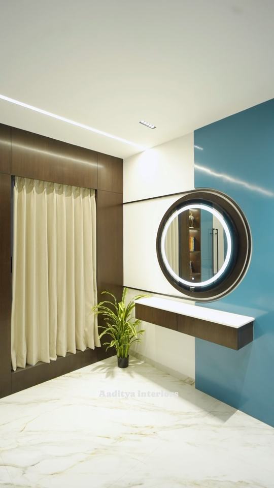 Dark veneer with Inky Blue wardrobes